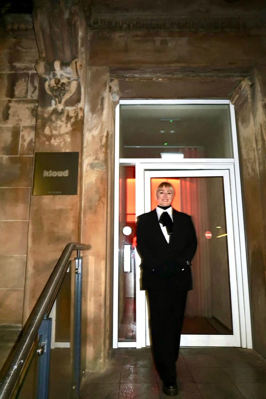 Elite Security officer in formal dress front-of-house at a venue